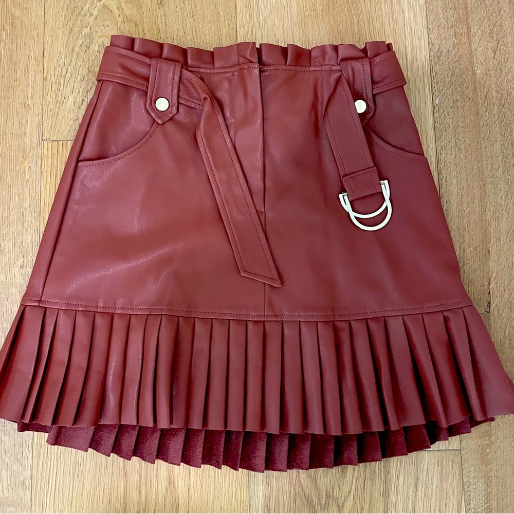 Zara size S faux leather skirt with pleats and buckle. Work appropriate length